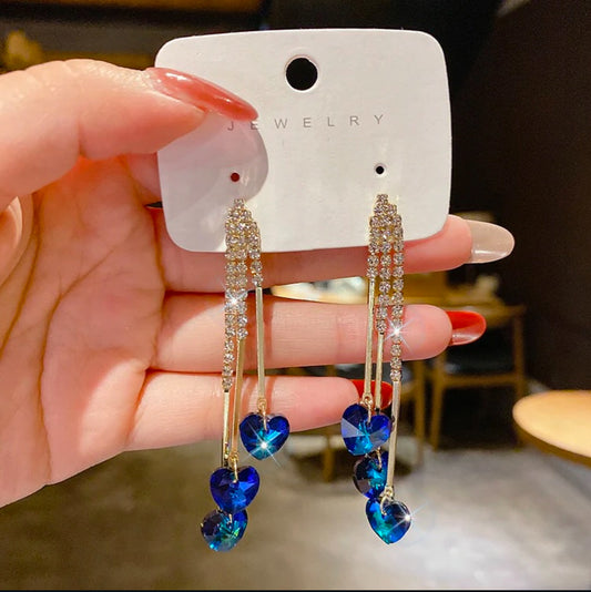 Aretes largos con corazones