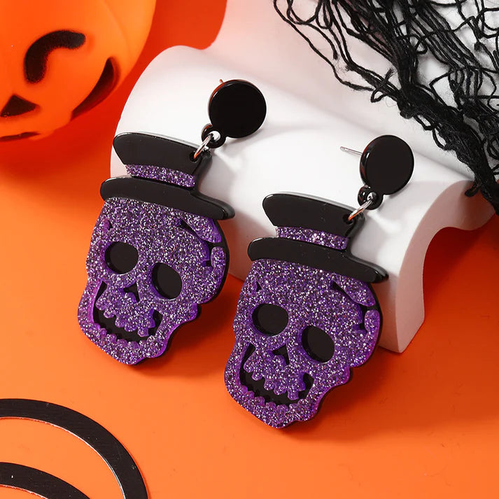 Aretes de calavera morada