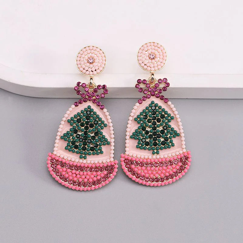 Aretes navideños rosas