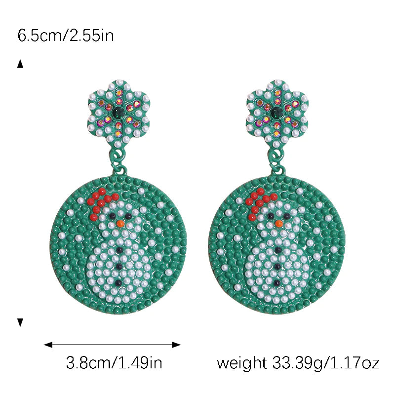 Aretes verdes de oso de nieve