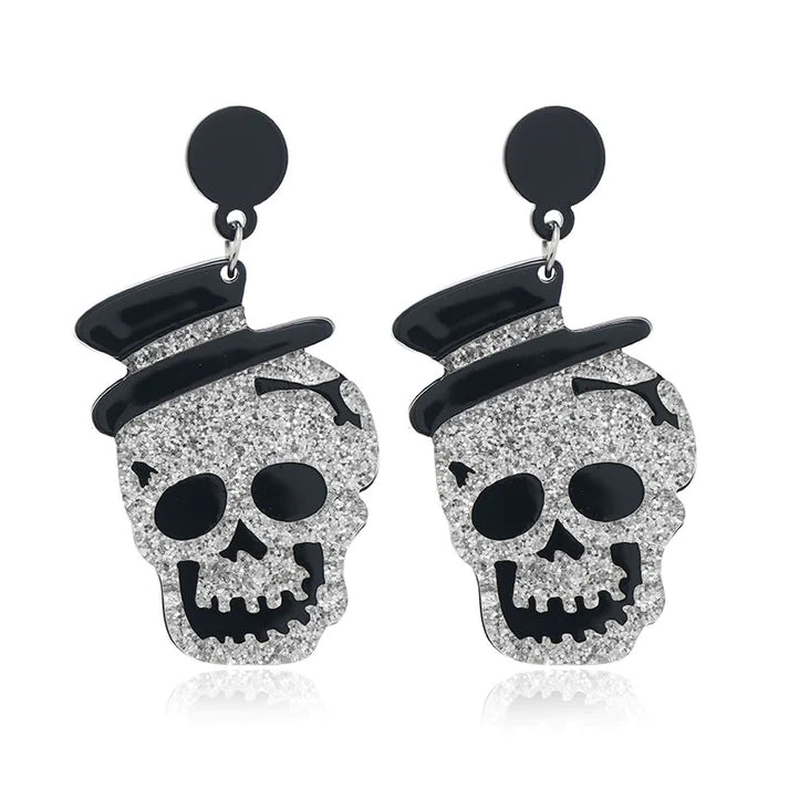 Aretes de calavera plateada